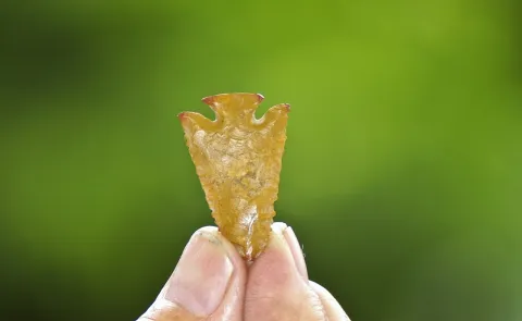 The red tips are from heat treating the stone in fire, making it stronger.